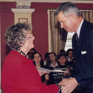 Marie-Ann Grosskreutz accepting the Queen's Trust Award of a $3000 grant for BTQ in 1999 from Queensland Governor Major General Peter Arnison.