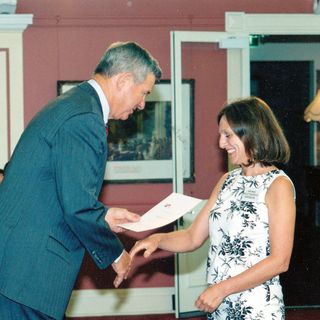 President Kim Swan (2002-2004) accepting BTQ's $10,000 Foundation for Young Australians Grant from the Queensland Governor, The Honourable Peter Arnison in 2003