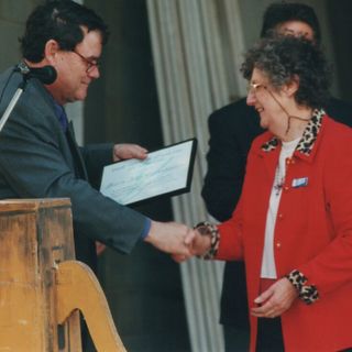 The Honourable Matt Foley presenting President Marie-Ann Grosskreutz with her Life Member's certificate.